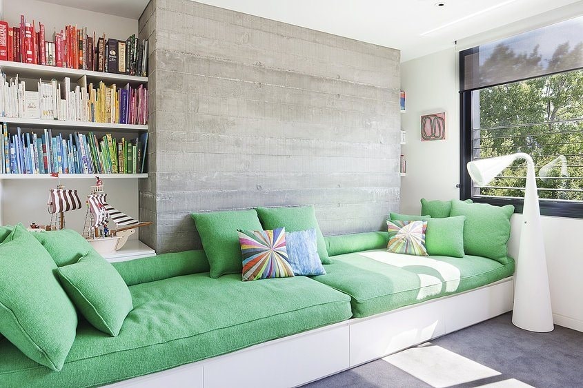 Green themed lounge rooms with polished concrete floors