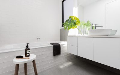 White Themed Bathrooms with Concrete Polished Floors
